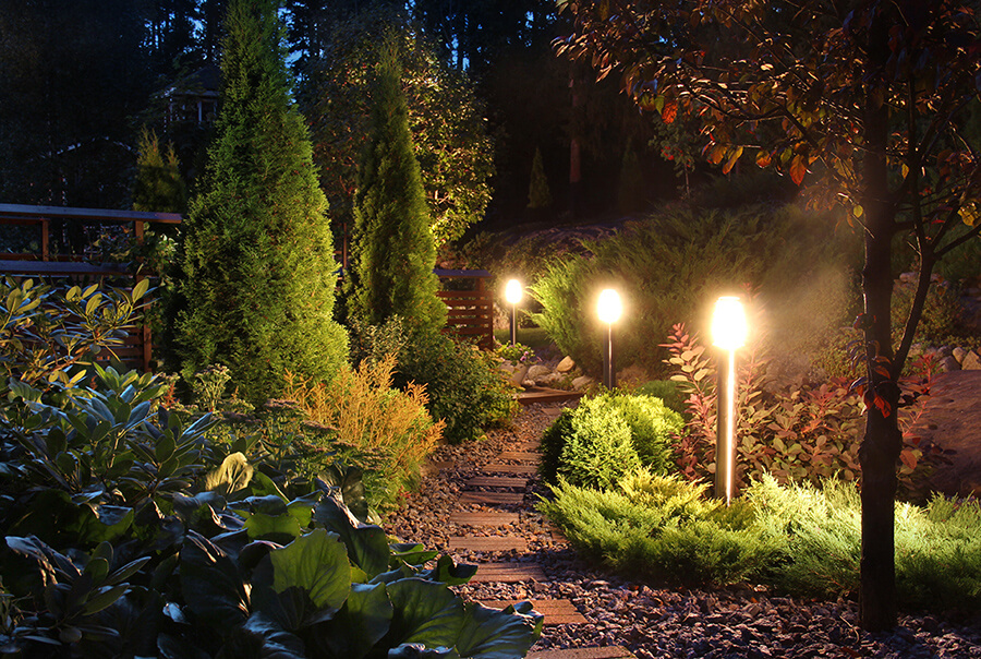 Residential Electrical Outdoor Lighting Electrician - Lights illuminating path in outdoor yard